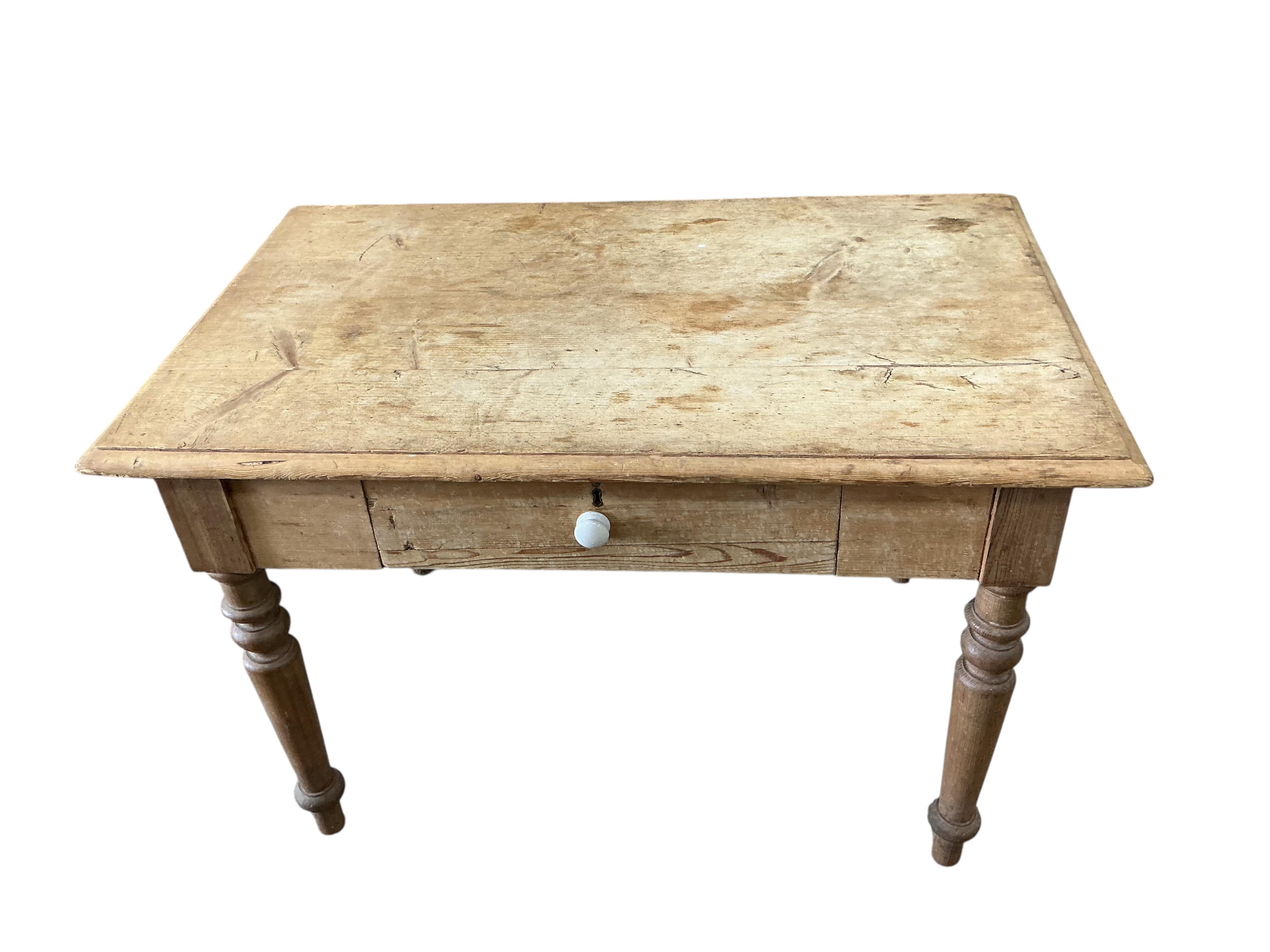 A small Victorian rectangular pine kitchen table, fitted drawer, width 114cm, depth 69cm, height 75cm